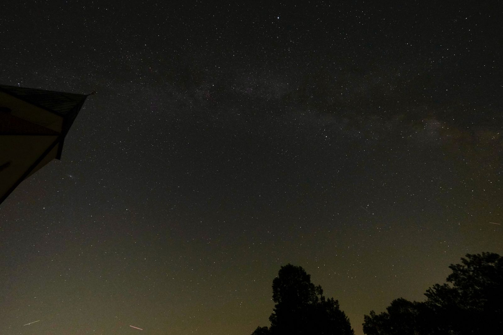 A deep blue starry night sky